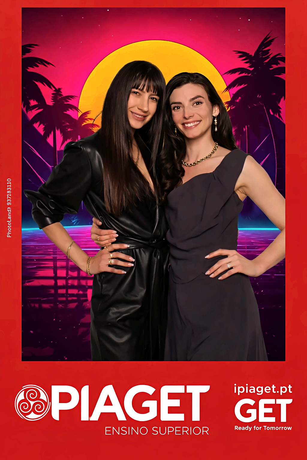 Guests posing with a retro neon backdrop
